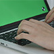 Girl Typing on Green Screen Laptop - VideoHive Item for Sale
