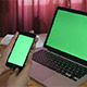 Girl Holding Phone with Laptop Green Screen - VideoHive Item for Sale