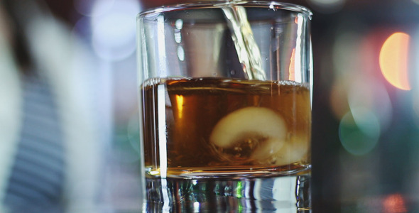 Bartender Pours Whiskey