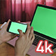 Girl Using her Phone with Green Screen Laptop - VideoHive Item for Sale