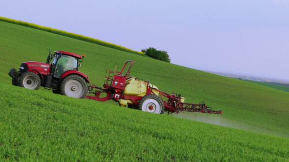 Tractor on Hilly Field