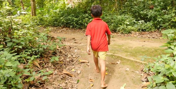 Poor Kid Walking On Forest Trail