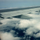 Airplane Flying Above The Clouds - VideoHive Item for Sale