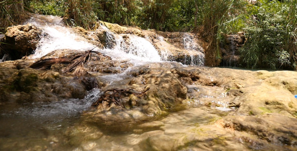 Small Waterfall On A Mountain River