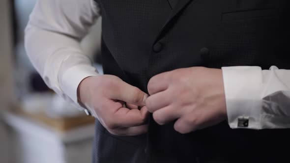 Handsome Groom Wearing a Jacket. Wedding Morning. Businessman