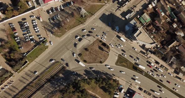 Top Down Aerial Drone Footage of a Medium Sized Roundabout in a City
