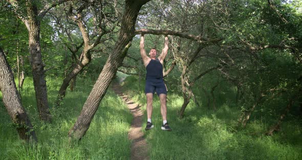 Athletic Man Doing Pull Ups