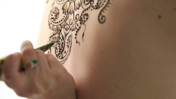 Mehendi. Creating Complex Pattern On Model's Back 