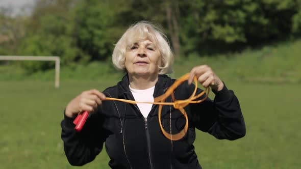 Active Senior Elderly 80 Years Old Caucasian Woman Do Morning Physical Exercises