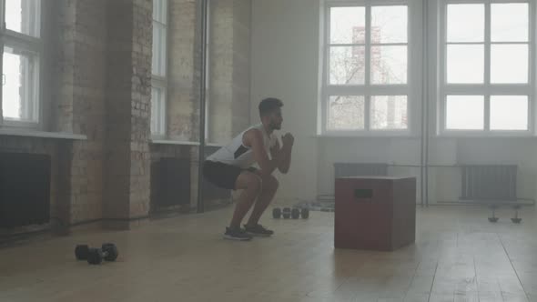 Afro Sportsman Doing Endurance Exercises