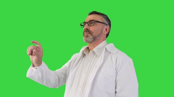Doctor Is Touching Digital Virtual Screen on a Green Screen Chroma Key