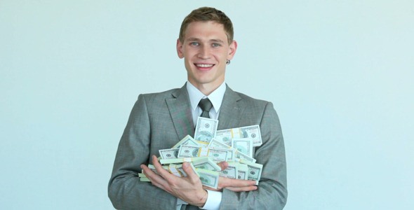 Businessman With Heap of Dollars