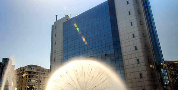 Spraying Spherical Fountain With Building
