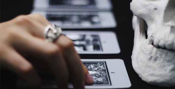 Woman Lays Tarot Cards