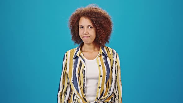 African American Woman with Kinky Hair Feels Disappointed