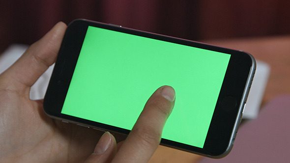 Girl Using Smartphone with Green Screen alt