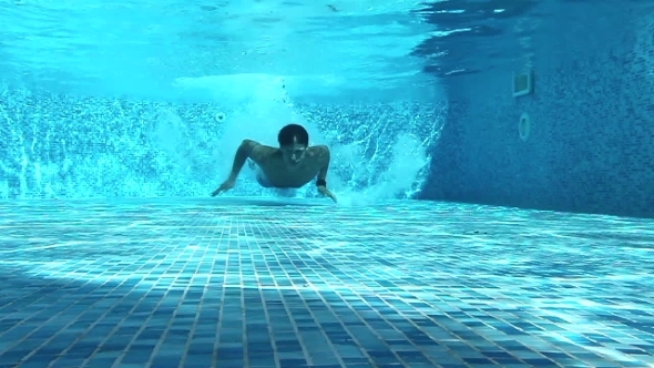 Man Swimming Under Water