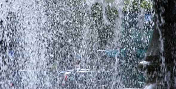 Waterfall and the City Traffic and People 2