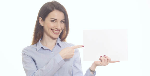 Showing Blank Paper with Finger and Smiling