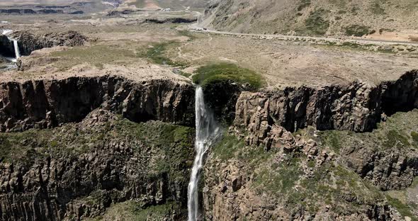 Aerial view of an approach to the inverted waterfall located in the maule on a sunny day.