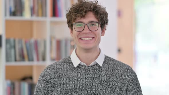 Portrait of Young Man Smiling at Camera