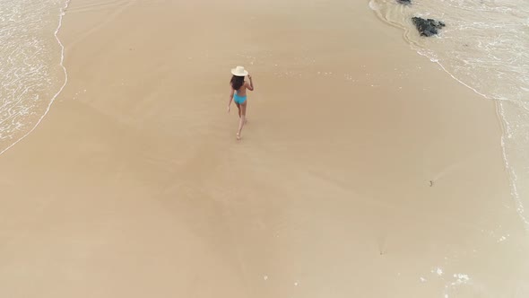 Flyover Indian Girl In Bikini Walking On Beach
