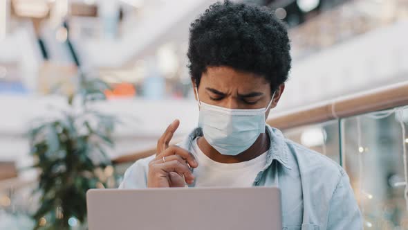 Portrait African American Guy Student User Business Man in Medical Mask Thinking Plan Creates Idea