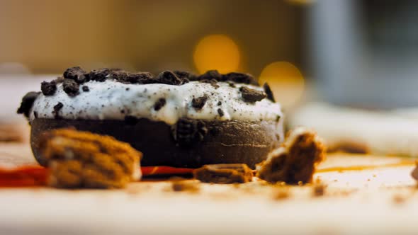 Chocolate Donuts Decorated with Pieces of Oreo Biscuits