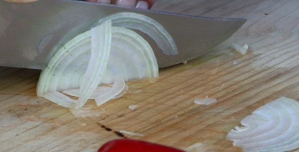 Chopping Onion on Wooden Plate 2 alt