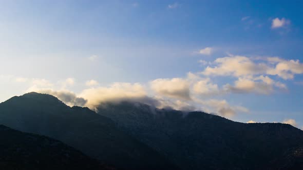 Time lapse of Clouds moving above Mountains. Beautiful Landscape Mediterranean