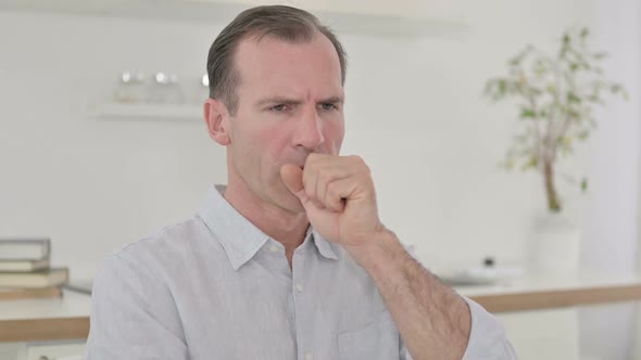 Portrait of Sick Middle Aged Man Coughing