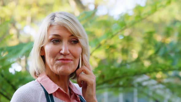Mature woman talking on mobile phone