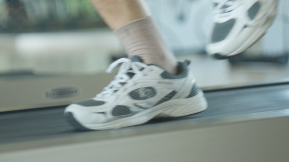 Man Running On Treadmill