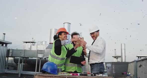 All Three Good Looking Workers Drank Beer While