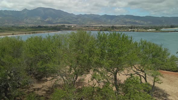 Aerial view of Kaiaka bay beach revealing balancing rock in Haleiwa