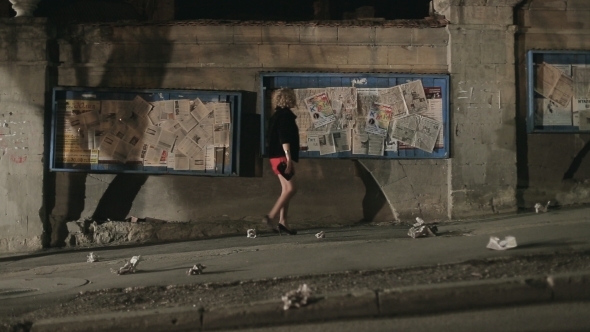 Beautiful Woman In High Heels And a Dress Going alt