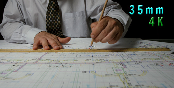Architect Draws A Draft Using A Ruler 07