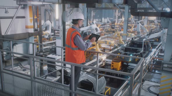 Mature Worker Controlling Production Line