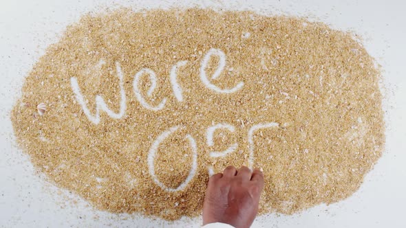 Hand Writing On Beach Sand Were Open