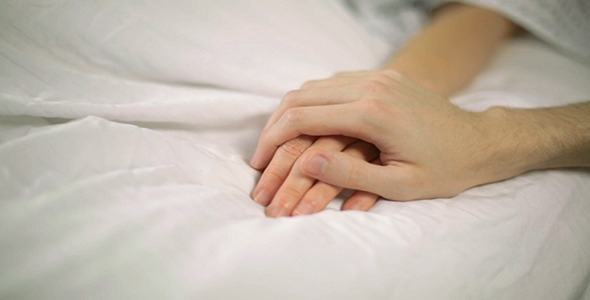 Female Hospital Patient Gets a Reassuring Hand