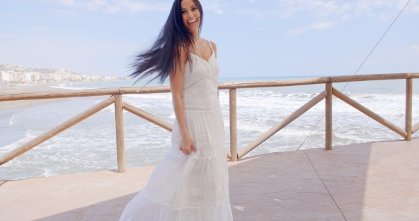 Playful Lady In White Enjoying At Beach Pathway