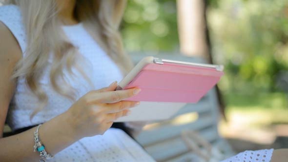 Girl Hands Using Tablet PC alt