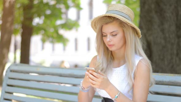 Girl Doing Text on Smartphone