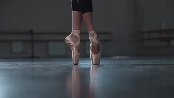 Professional Woman Ballerina Walking on the Tips of Her Pointe Shoes