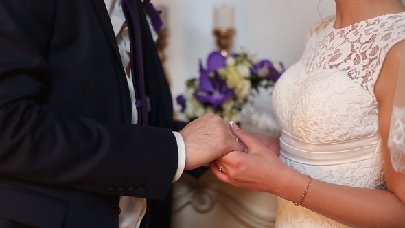 Young Newlyweds Couple Holding Hands