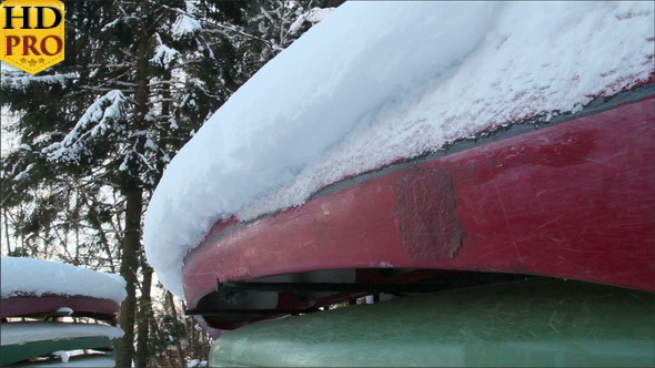 Colorful Boats Covered with Snow alt