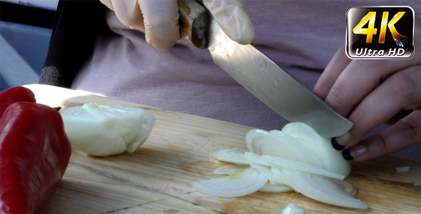 Chopping Onion on Wooden Plate 3