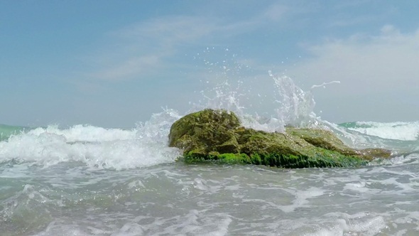 Waves Breaking on the Stone