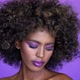 Portrait of Beautiful African American Female Model with Afro Hair and Glowing Purple Makeup - VideoHive Item for Sale