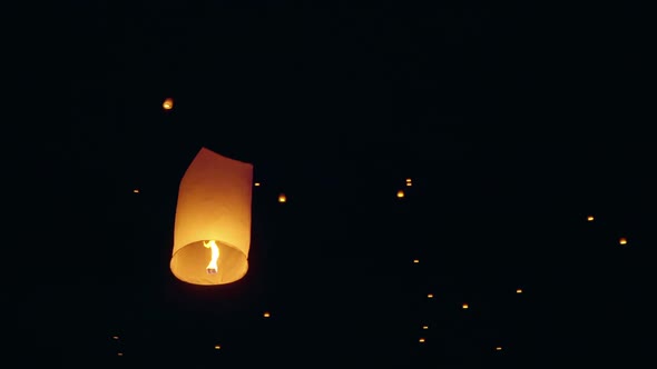 Sky Lanterns Fly Into The Night Sky
